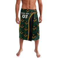 Men's lavalava-style shorts with green and gold tribal motifs, black side panel