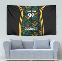 Black tapestry with green gold star-like pattern, yellow stripes, 'Jamaica' and '07'