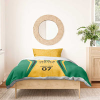Yellow and green bedding set with gold geometric motif, Jamaica emblem, and custom text 07