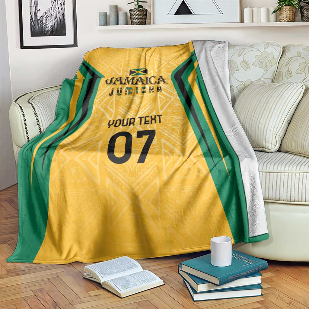 Yellow and green ethnic blanket with custom text and number 07, draped on sofa