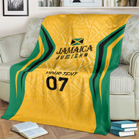 Yellow blanket with green and black tribal graphic, custom text and number 07