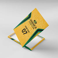 Angled Jamaica canvas wall art with gold geometric pattern, green and black accents