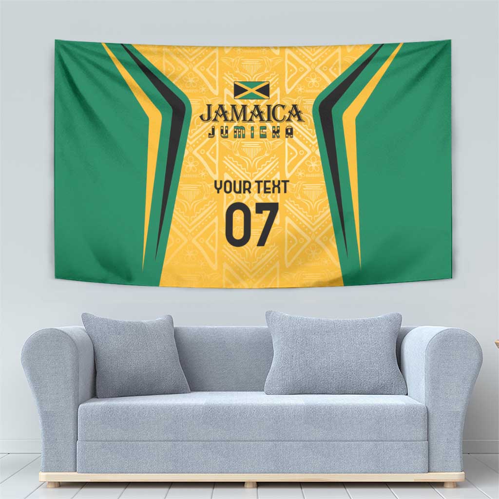 Wall tapestry with green border and gold accents, centered Jamaica emblem, 'Your text' and '07'