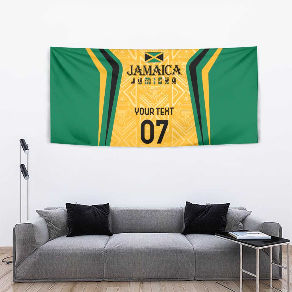 Wall tapestry with green wings and yellow center, Jamaica crest, 'Your text' and bold '07'