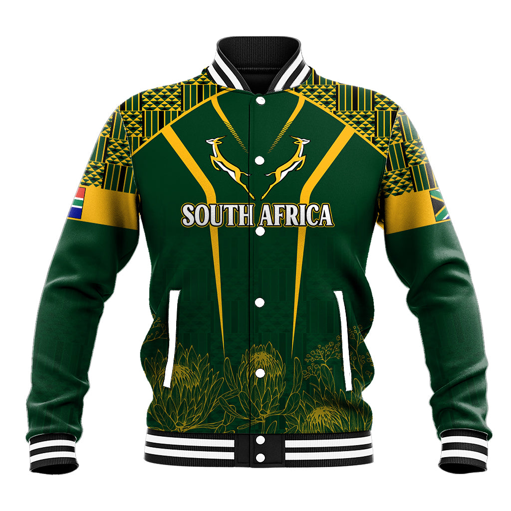 Green baseball jacket with kente-style pattern, gold trim, 'South Africa' print, antelope emblem