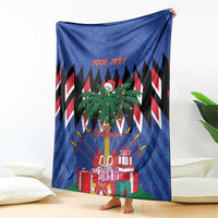 Blue Christmas blanket draped vertically with palm tree and gifts; "YOUR TEXT" in center
