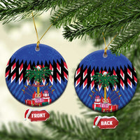 Blue round ceramic Christmas ornament with gold hanger; front and back views shown