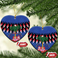 Blue heart-shaped ceramic Christmas ornament with gold hanger; front and back views