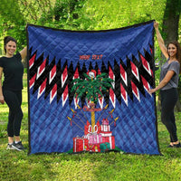 Blue quilt spread outdoors with zigzag pattern, palm tree and Christmas gift illustrations