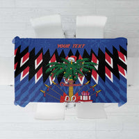 Blue Christmas tablecloth with chevron pattern, palm tree and gift graphic center