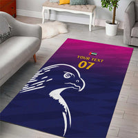 Blue custom area rug with white falcon head design and 'Your Text 07' text
