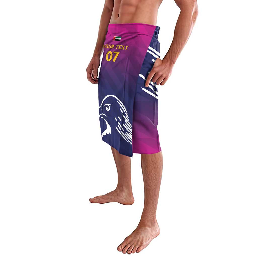 Cricket lavalava shorts, blue and magenta with falcon print; front panel shows 'Your Text 07'.