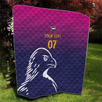 Custom quilt blanket with Arabian falcon artwork, quilted texture, and yellow "YOUR TEXT"