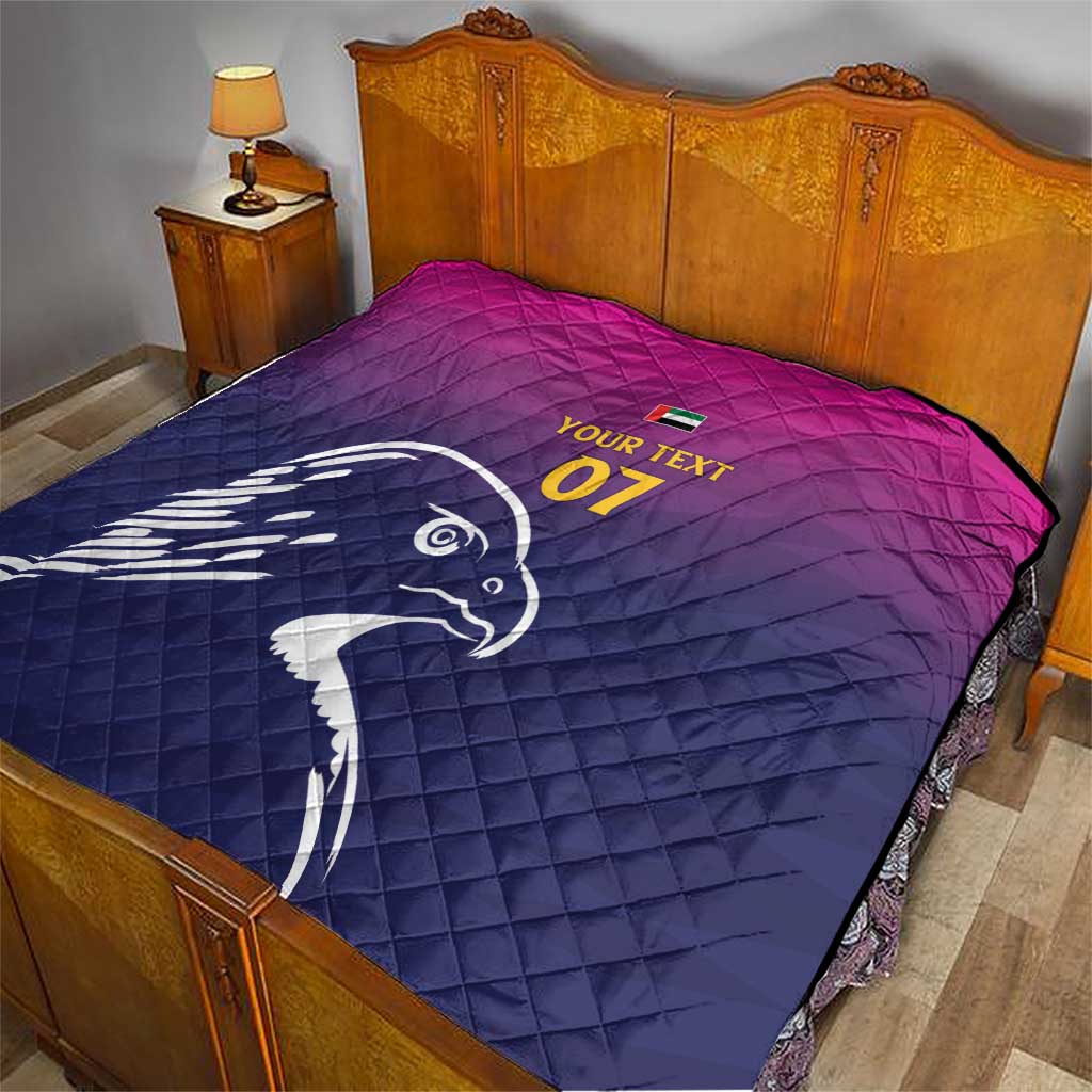 Custom quilt blanket on bed, Arabian falcon graphic with quilted pattern and yellow "07"