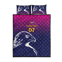 Blue and purple quilt bed set with Arabian falcon print, two pillows, flat lay