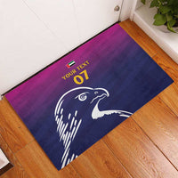 Blue rubber doormat with purple edge, white falcon print and custom text 07