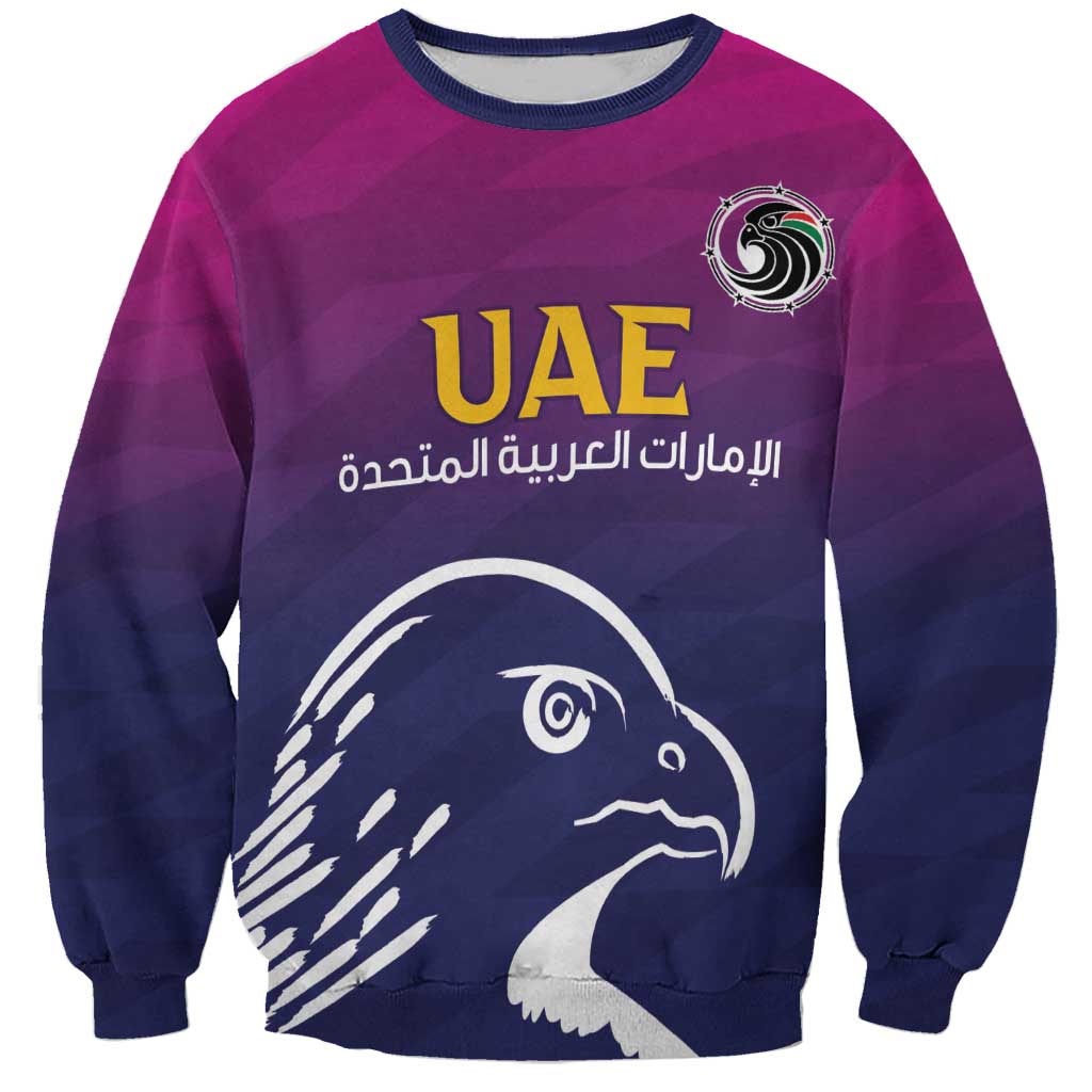 Unisex cricket sweatshirt in purple and navy with UAE logo and falcon graphic, long sleeves