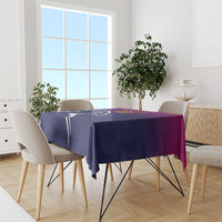 Custom tablecloth draped over a dining table, dark blue and purple with Arabian falcon print.