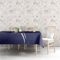 Custom tablecloth on dining set with Arabian falcon print, dark blue top and purple edge.