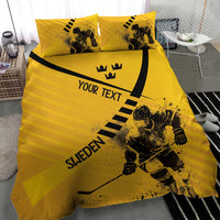 Yellow duvet and pillow set featuring hockey player silhouette, black stripes, and Sweden branding