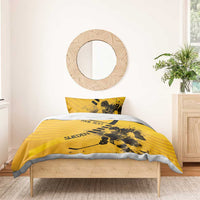 Yellow Sweden hockey duvet set with player artwork, black stripes, and matching pillow