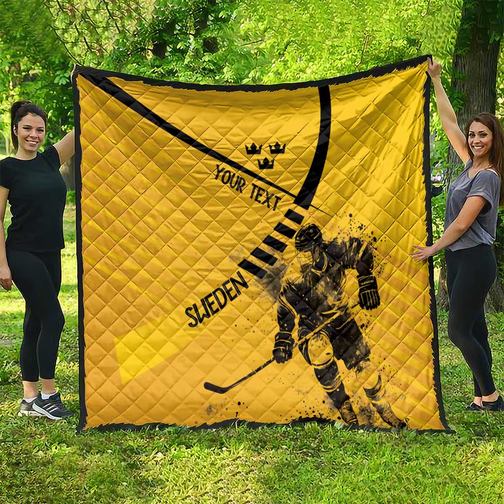 Yellow personalized quilt with black trim; crown icon, “YOUR TEXT,” goalie action graphic, “SWEDEN”