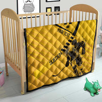 Yellow quilt on baby bed with black border; crown, “YOUR TEXT,” goalie artwork, “SWEDEN”