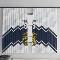 Window curtain pair with white and light-blue stripe panels, navy chevrons, yellow lion crest.