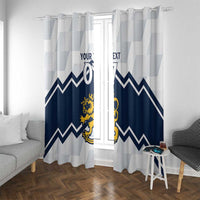 Printed window curtains with navy chevron zigzags, white-blue striped panels, yellow crest.