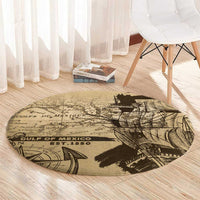 Round tan vintage map rug with black “Gulf of Mexico” and ship graphic, full view