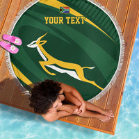 Round green personalized rugby beach blanket with fringe, emblem, and “YOUR TEXT”