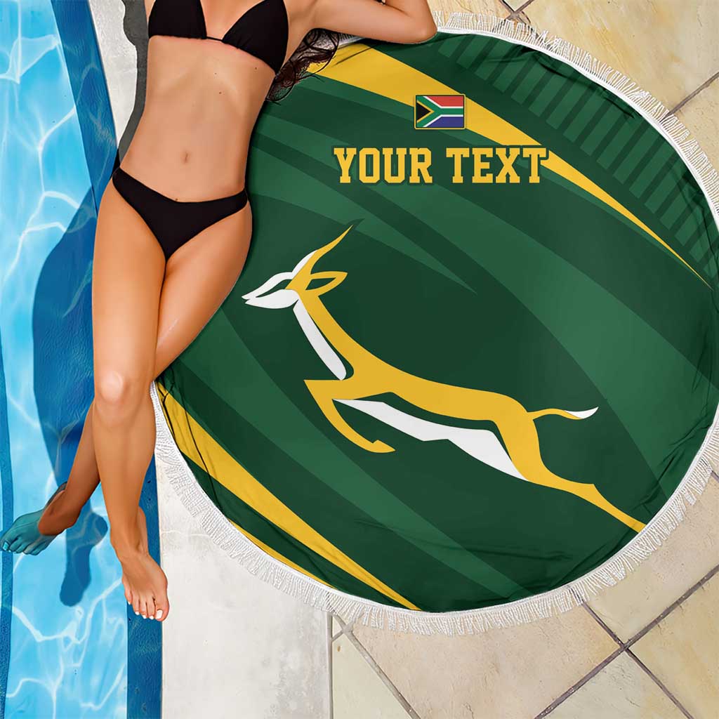Round green personalized rugby beach blanket with fringe and “YOUR TEXT” by pool