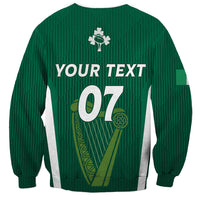 Green crewneck sweatshirt back with 'YOUR TEXT', '07' and shamrock graphic, side stripe