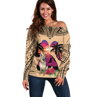 Off-shoulder tan sweater with long sleeves and colorful German shepherd graphic