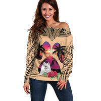 Tan off-shoulder sweater with Polynesian pattern and Samoyed dog graphic, long sleeves