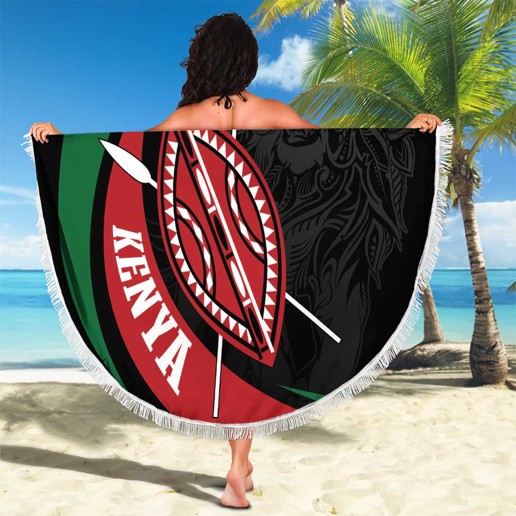Round black beach blanket with Kenya shield emblem, green-red stripes, and white fringe