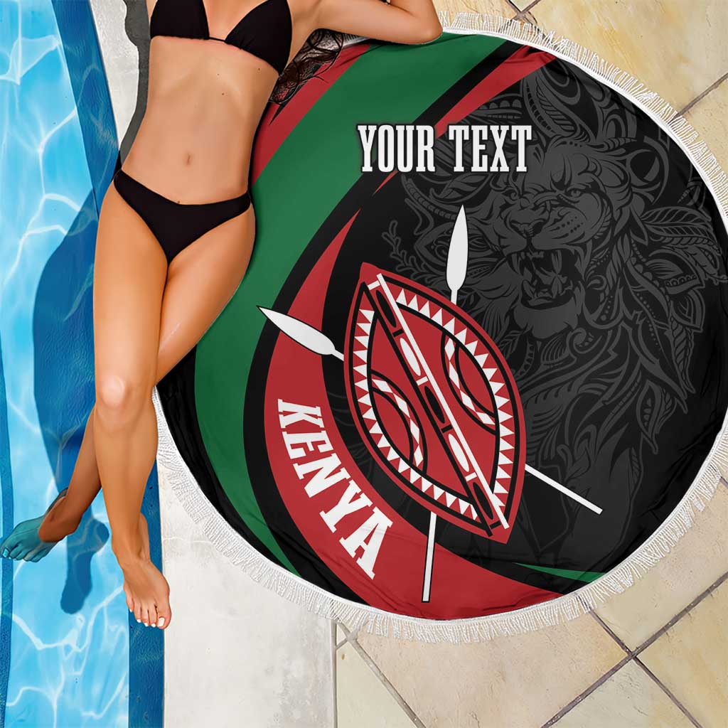 Round black beach blanket with “YOUR TEXT” and Kenya shield emblem, white fringe edge