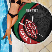 Round black beach blanket with “YOUR TEXT” and Kenya shield emblem, white fringe edge