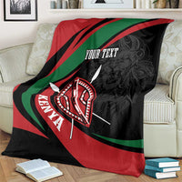 Black blanket with red and green stripe pattern and shield lion emblem, “YOUR TEXT”