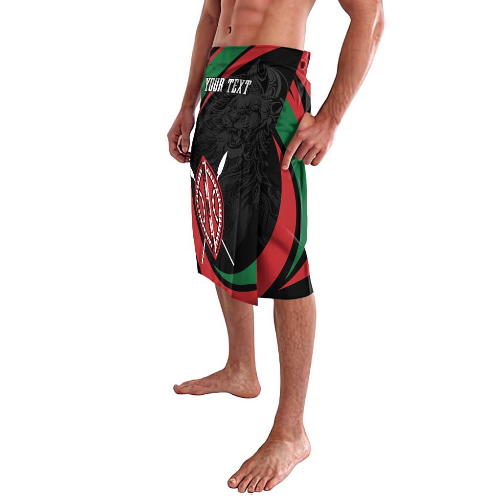 Personalized black lavalava with red/green warrior shield graphic and 'Your Text' panel
