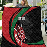 Personalized quilt blanket draped display, black/red/green design with lion shield graphic