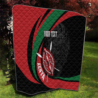 Personalized quilt blanket with black, red, and green graphic and lion warrior shield