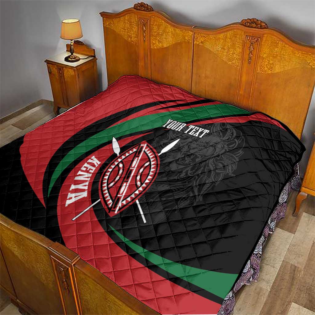 Personalized quilt blanket on bed, black/red/green design with lion shield and “YOUR TEXT”