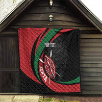 Personalized quilt blanket hanging on wall, black/red/green lion warrior shield motif