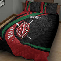 Personalized quilt bed set on bed: black quilt with red/green bands and lion emblem