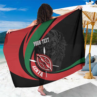 Black personalized sarong with lion-warrior shield graphic and 'YOUR TEXT' center print