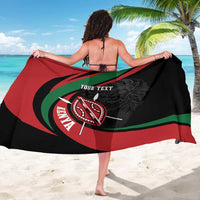 Black sarong back view with large shield emblem and 'YOUR TEXT' across center