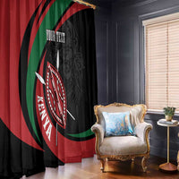 Black and red curtain panels with lion warrior and Maasai shield graphic beside window blinds