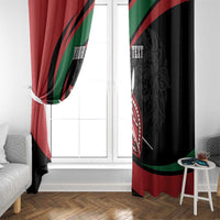 Black and red window curtain panels framing a white door, Maasai shield graphic visible