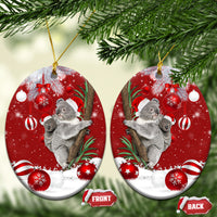 Red ceramic oval koala Santa Christmas ornament with gold hanging loop